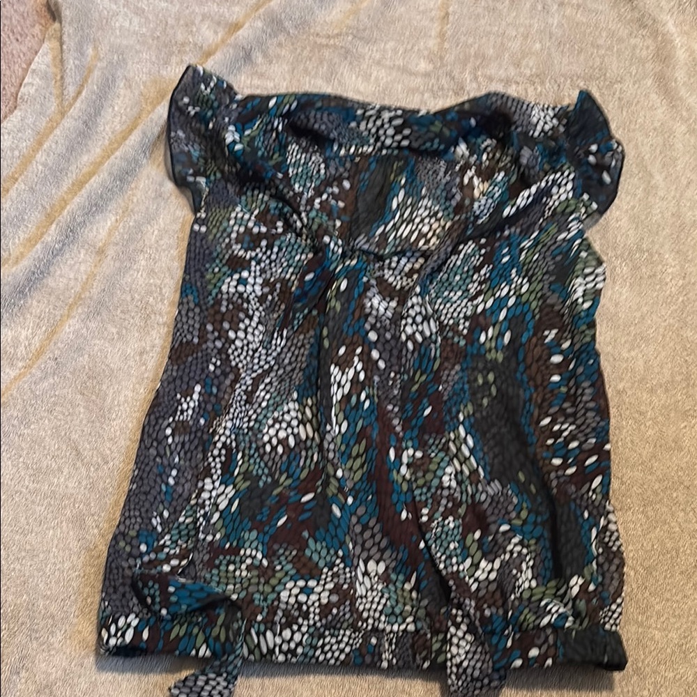 Black and Blue Sleeveless Ruffled Blouse with Tie Front